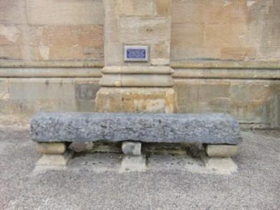 Photo of a seat outside Dunfermline Abbey Church, believed to have been made from a piece of the original shrine to st. Margaret