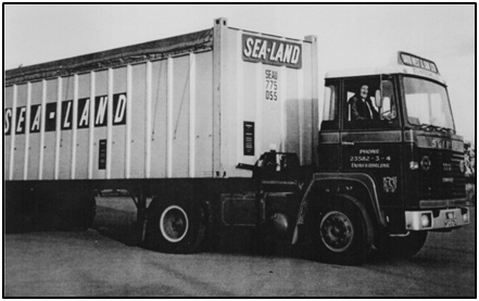 Photo circa 1973 of Jim West at the wheel of a new Scania tractor unit loaded with a Sea-Land container unit.