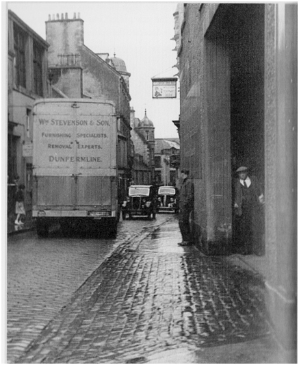 Photo of one of Stevenson’s removal vans making a tight turn into the firm’s loading bay at Bruce Street