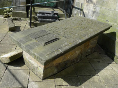 Photo of the original gravestone outside the Erskine Church